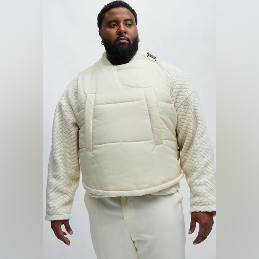 Roller Coaster Puffer Vest" in Off White from the brand Fashion Nova. - Picture 5 of 10
